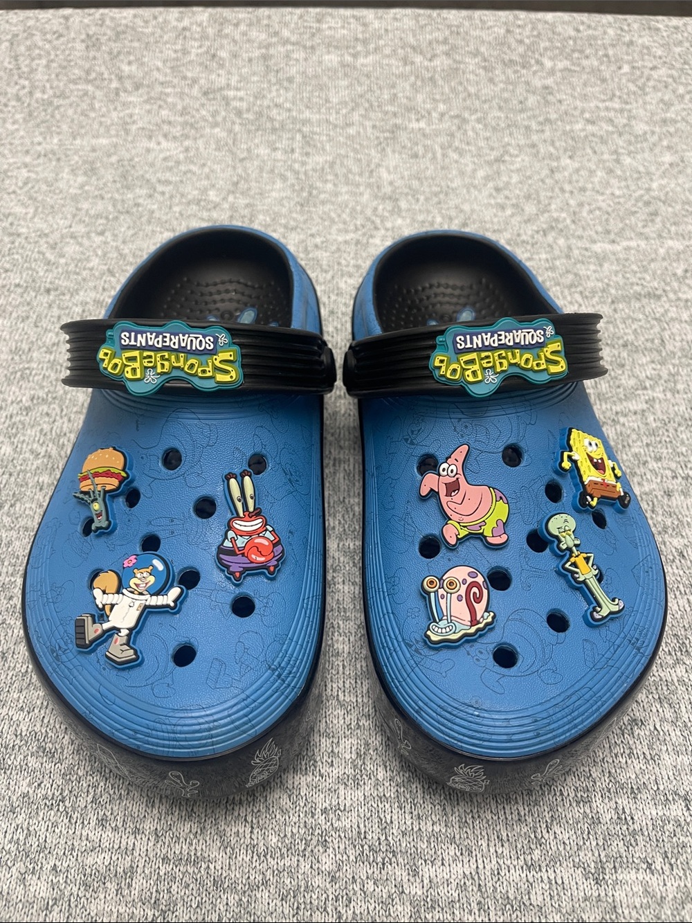 Blue Kids Size 1 Crocs with SpongeBob Charms. No, never worn.